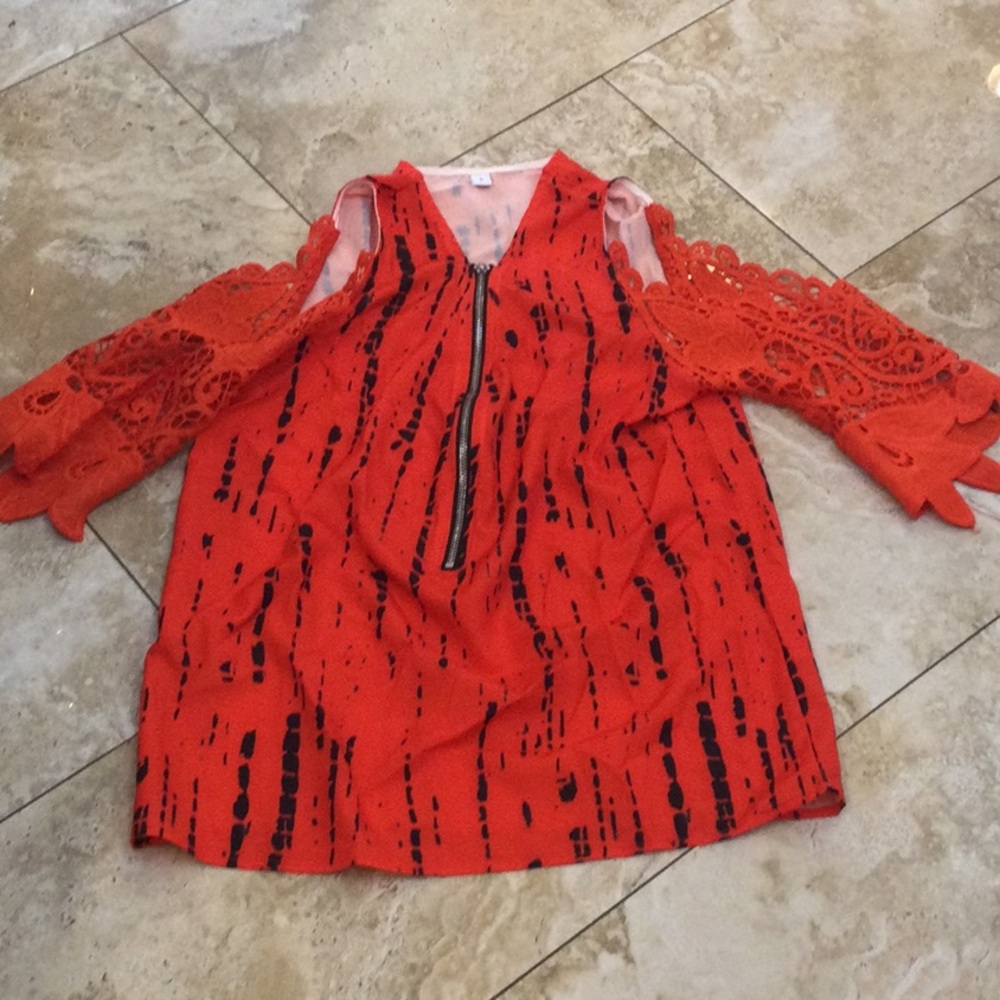 Vibrant Red Top with black accents